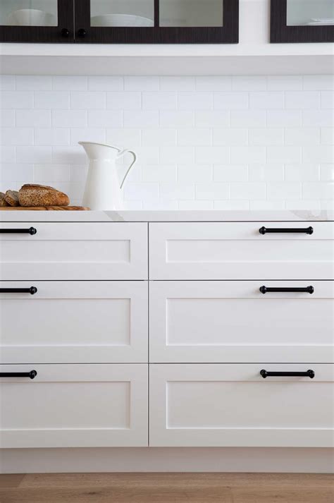 white shaker door handles